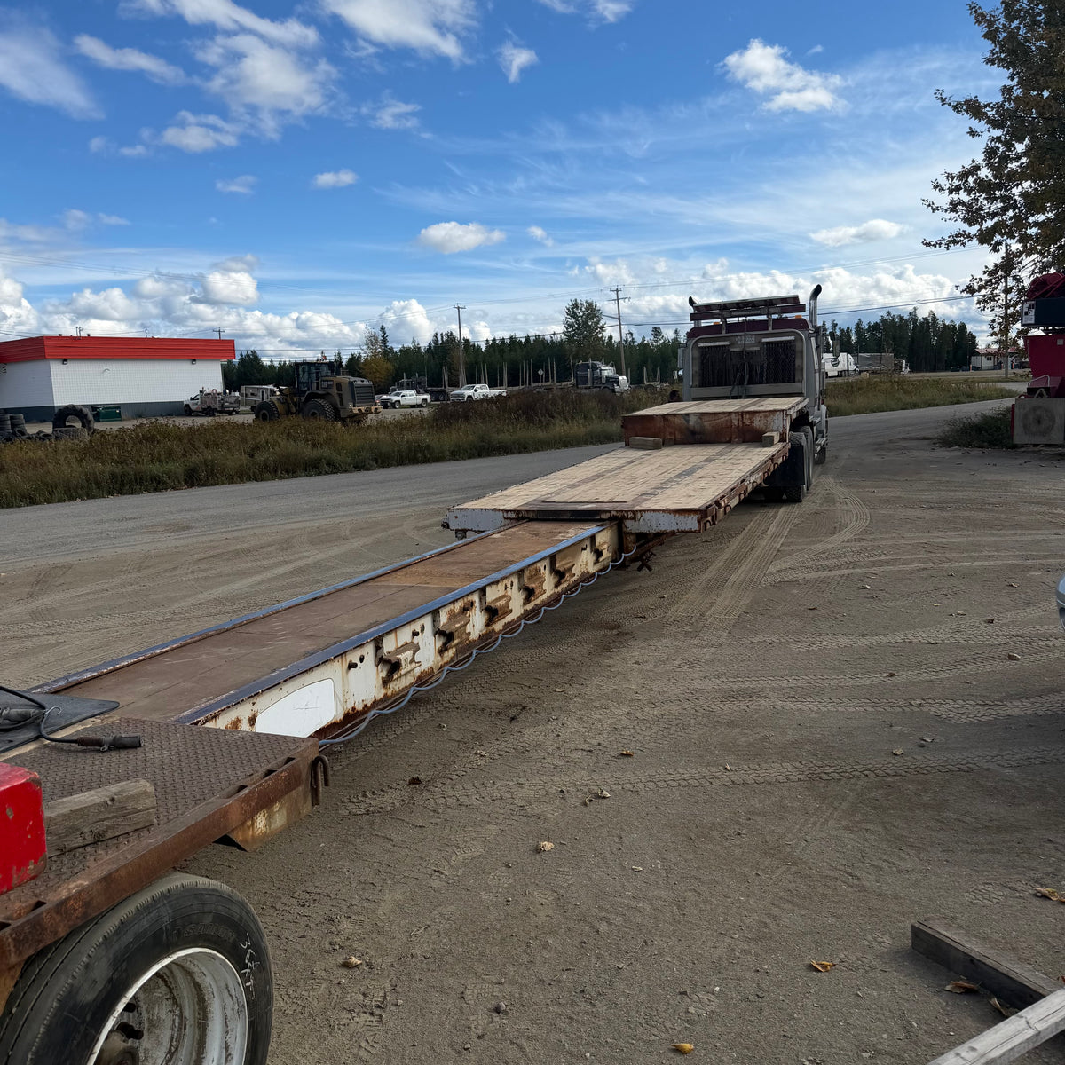 Tandem axle trombone step deck,