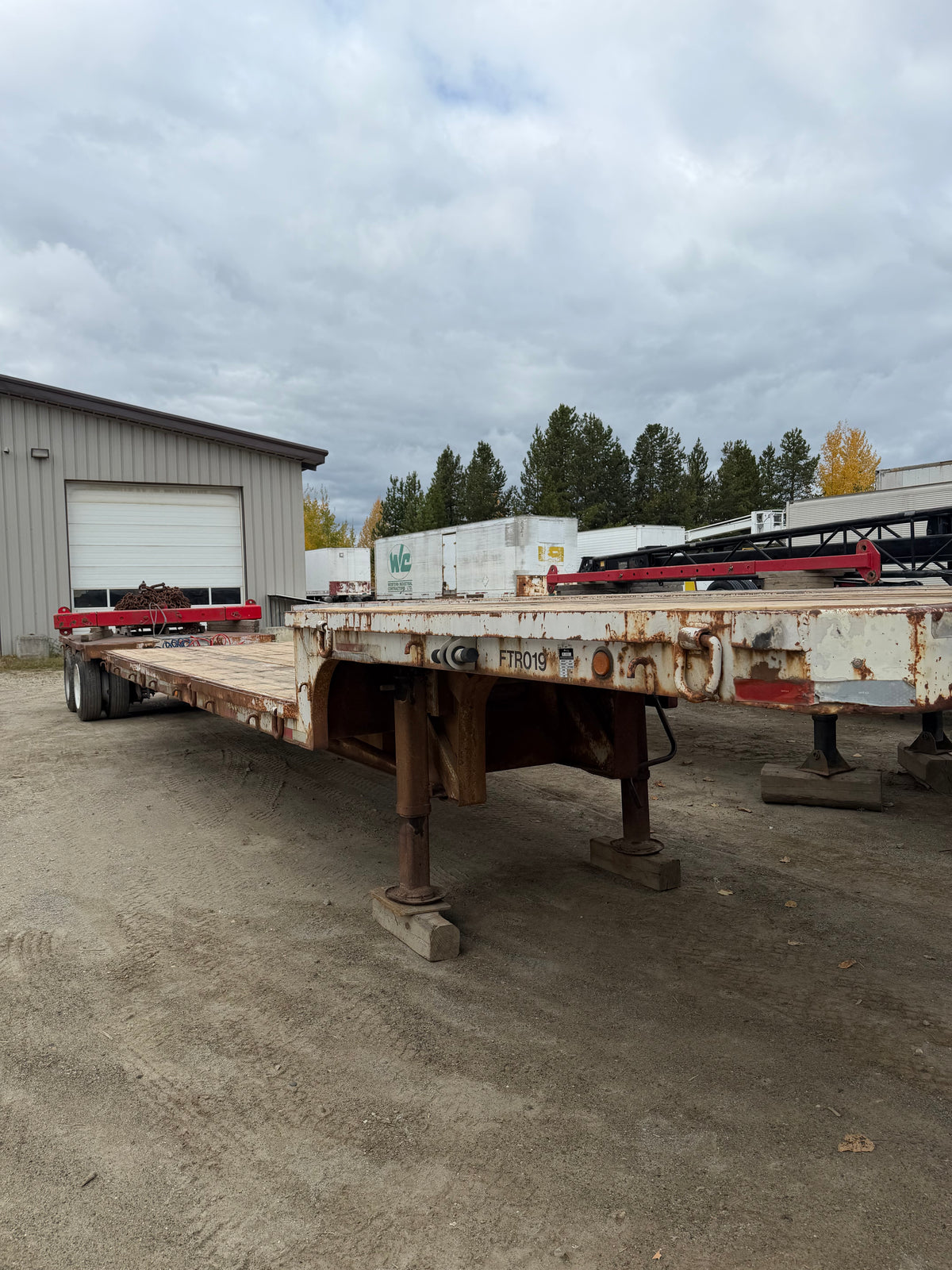 Tandem axle trombone step deck,