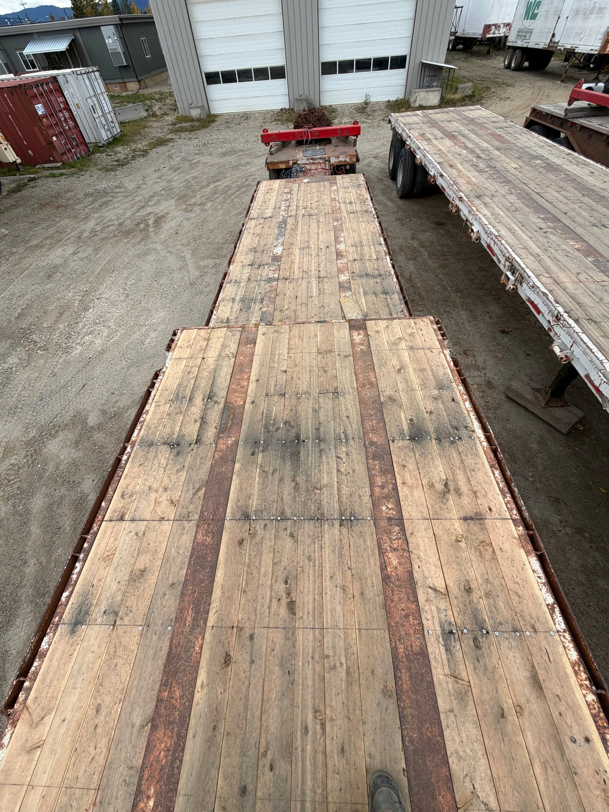 Tandem axle trombone step deck,