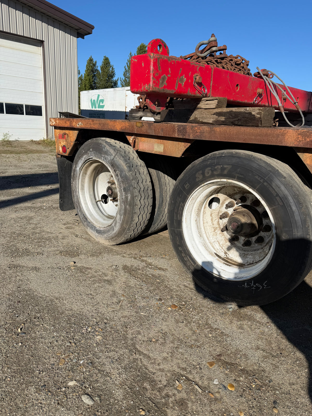 Tandem axle trombone step deck,